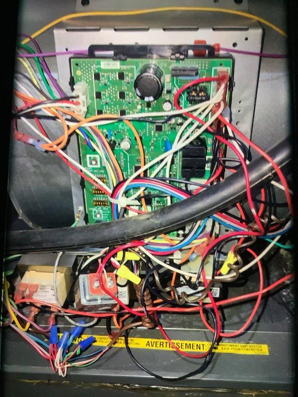 Performed scheduled MVP Heating maintenance visit and discovered significant frost buildup on evaporator coils indicating restricted airflow. Inspected control board and wiring connections which appeared intact with no visible damage. Documented system condition with photographs for service record.