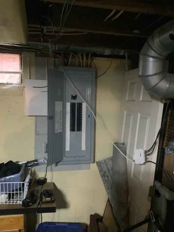 Conducted an estimate for replacement of a 21-year-old furnace and AC system in a residential basement. Inspected the existing HVAC unit, ductwork configuration, and electrical panel to assess compatibility requirements for the new installation. Documented the current system setup including sheet metal connections, drainage components, and available utility access points for proper replacement planning.