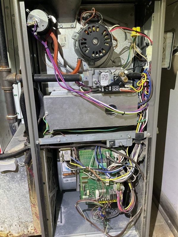 Performed routine maintenance on 6-year-old furnace system installed in 2019. Inspected interior components including blower motor, control board, and electrical connections with all wiring in proper order. Completed comprehensive heating tune-up per MVP maintenance agreement with all systems functioning correctly.
