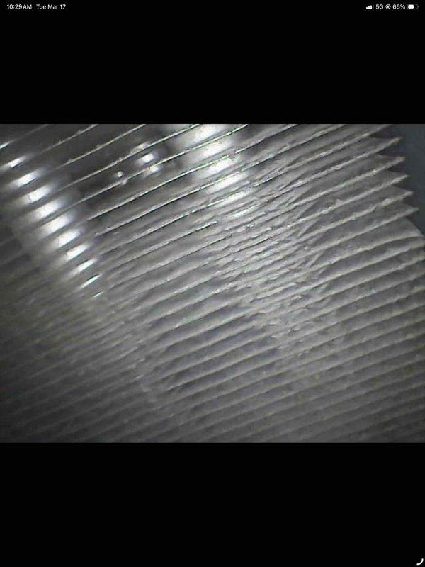 Diagnosed 15-year-old furnace with no heat issue, finding severe rust and corrosion on heat exchanger tubes. Visual inspection revealed significant deterioration of burner assembly and compromised heat transfer fins, indicating end-of-life failure requiring full system replacement rather than repair.