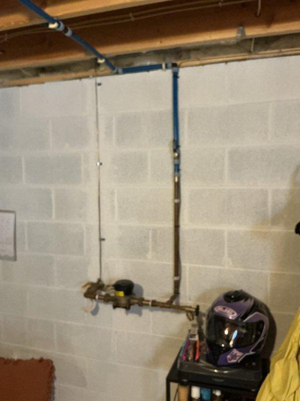 Installed a water softener system in the basement utility room of a 5-year-old home. Connected the unit to existing copper water supply lines using appropriate PVC piping for drainage. Verified proper operation of the system and ensured no leaks at connection points.