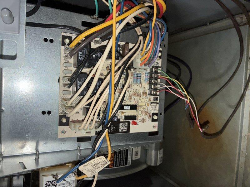 Performed scheduled maintenance on 10-year-old heating system. Inspected electrical control module and PCB connections, noting all wires were properly secured and in good condition. Examined blower wheel assembly which showed normal dust accumulation; cleaned fins to ensure optimal airflow and system efficiency.