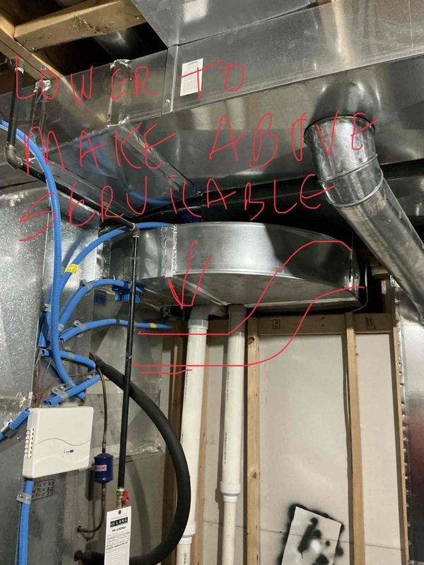 Conducted an assessment of an existing HVAC system requiring replacement. Documented current installation including furnace with exposed internal components, metal ductwork, PEX plumbing connections, and PVC drainage pipes. Identified necessary modifications to lower components for proper installation access as noted in documentation.