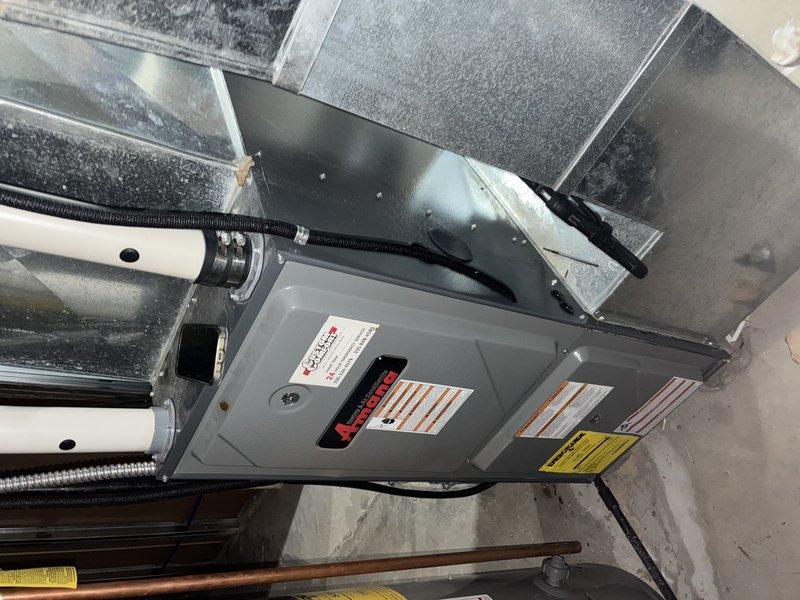 Performed routine heating maintenance on 16-year-old HVAC system. Inspected blower motor assembly and electrical connections, documenting all components with photos. Confirmed proper operation of residential heating unit.