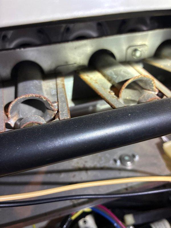 Completed scheduled furnace tune-up service, inspecting interior components and heat exchanger which showed oxidation on metal connections. Examined and cleaned blower wheel assembly, which was found to be in good working condition with no debris accumulation between the fan blades.