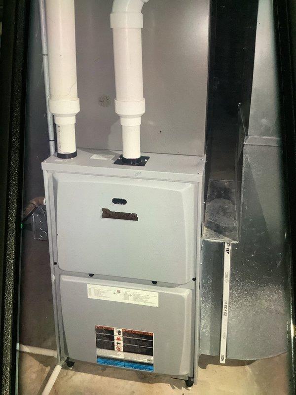 Performed scheduled maintenance on 7-year-old gas furnace. Inspected and verified proper electrical connections, including wire harnesses and connectors. Examined ventilation system including PVC intake and exhaust pipes, confirming proper installation and function.