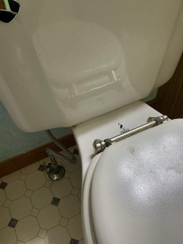 Reconnected internal toilet components in 40-year-old home. Inspected tank mechanism including float ball assembly and flush valve. Completed service and tested for proper functionality.