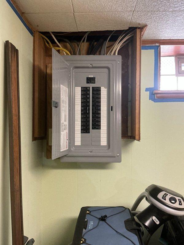 Conducted generator installation estimate at residential property, inspecting existing electrical panel and documenting site conditions. Created diagram showing proposed generator location in relation to room addition and existing electrical panel to facilitate proper installation planning.