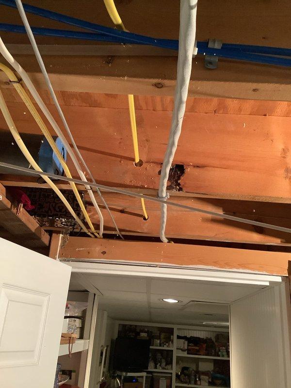 Installed a new dedicated electrical outlet for stairlift operation, running wiring from the main electrical panel through ceiling joists to the optimal location within required 6-foot proximity of stairway. Successfully connected and tested the circuit, ensuring proper voltage and grounding for safe stairlift operation.