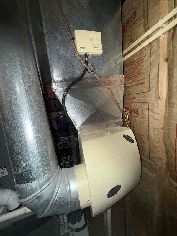 Successfully installed Aprilaire 600 whole-house humidifier system with mounting kit on existing HVAC ductwork. Connected and calibrated electronic control module with multi-wire thermostat integration for proper humidity regulation. System was tested and is functioning as designed.