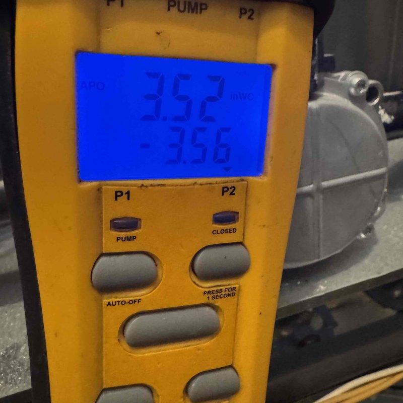 Performed comprehensive furnace tune-up including inspection of heating element which showed signs of wear and mineral deposits. Conducted pressure testing with digital gauge, documenting readings of 352/-356, indicating system is operating within acceptable parameters. Inspected all plumbing connections and verified proper installation of components.