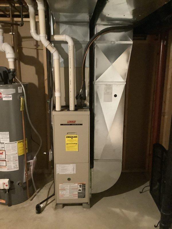 Successfully completed installation of a new Lennox 90% efficient furnace system with associated ductwork and PVC venting. System was properly connected to existing water heater and verified proper temperature operation with multi-probe testing equipment, with ambient temperature reading 59.1°F.