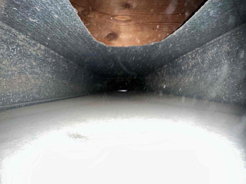 Completed comprehensive duct cleaning service on HVAC system with confirmed time window of 8-9am. Inspection revealed accumulation of dust and particulate matter on interior duct surfaces, with notable deposits on insulation lining. Thoroughly cleaned all accessible ductwork, removing contaminants to improve system efficiency and indoor air quality.