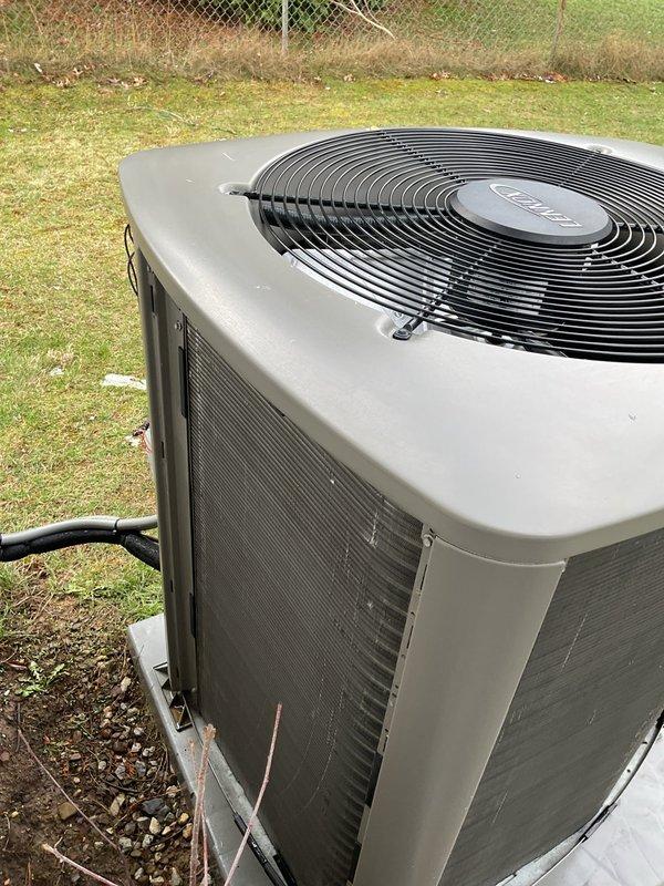 Performed routine maintenance on heat pump system as part of recurring MVP Heating Visit service. Inspected outdoor condensing unit, checking electrical connections and control board wiring. Examined condenser fan, cooling fins, and refrigerant lines for proper operation and condition.