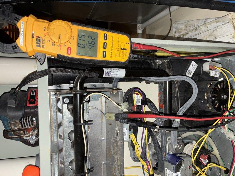 Performed routine MVP heating maintenance service. Inspected heat exchanger and coil assembly for proper condition, finding components clean and free from corrosion. Conducted electrical diagnostic testing with clamp meter, verifying proper amperage readings of 0.75A and voltage of 26.2V at control board, confirming system is operating within manufacturer specifications.