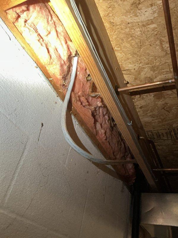 Performed comprehensive gas leak investigation in response to customer-reported odor. Conducted pressure test on existing gas lines and inspected exposed piping in unfinished areas, including basement utility space with copper lines and wall cavity with PVC piping. No active leaks detected; provided customer with quote for requested gas line relocation for kitchen stove as discussed with on-site contractor.