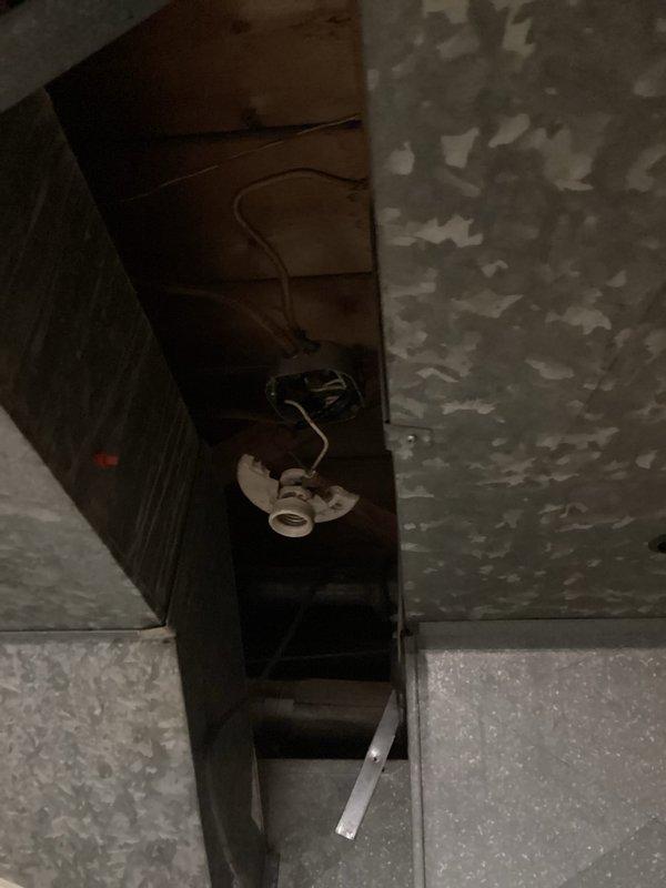 Diagnosed and repaired flickering lights and buzzing issues throughout the residence by inspecting junction boxes and panel connections. Identified loose connections in ceiling junction box and corrected faulty wiring in the main panel where several wire nuts had deteriorated. Replaced broken light socket in basement and tested all circuits to verify proper operation.