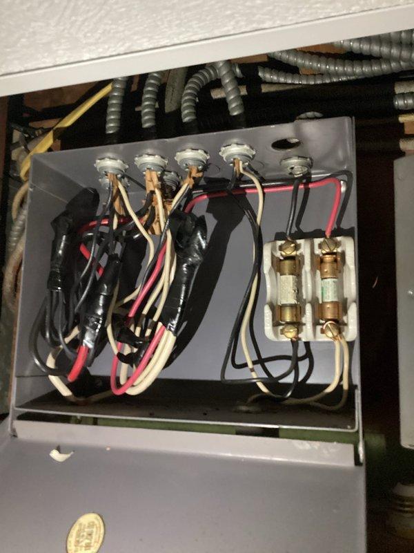 Diagnosed and repaired flickering lights and buzzing issues throughout the residence by inspecting junction boxes and panel connections. Identified loose connections in ceiling junction box and corrected faulty wiring in the main panel where several wire nuts had deteriorated. Replaced broken light socket in basement and tested all circuits to verify proper operation.