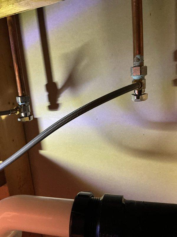 Successfully replaced two customer-supplied lavatory faucets with new angle stops in the hall bathroom and basement. Removed existing plumbing components and installed new tubular trap in the first-floor bathroom, while the basement lavatory required cutting off the PVC fitting and installing a new ABS trap adapter with appropriate connections.