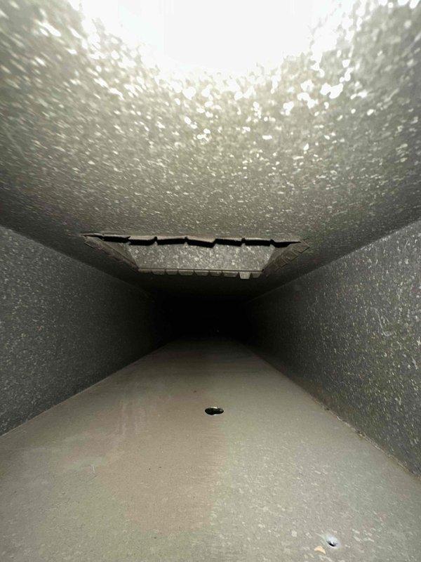 Completed comprehensive duct cleaning service using MVP system on residential HVAC ductwork. Inspection revealed significant accumulation of dust, lint and possible mold growth throughout the ventilation system, with debris buildup measuring several millimeters thick in some areas. Successfully cleaned and sanitized all ducts, removing obstructions and restoring proper airflow to improve indoor air quality and system efficiency.