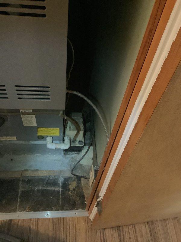 Conducted HVAC system assessment of existing furnace unit installed in utility closet. Inspected aging system components including ventilation, PVC drainage pipes, and connections. Provided comprehensive replacement estimate for complete HVAC system upgrade based on current equipment condition and household requirements.