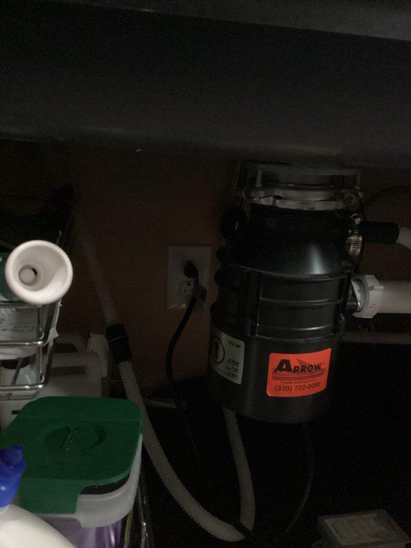 Diagnosed and repaired electrical issue where dishwasher and disposal were connected to same circuit, causing breaker to trip. Inspected breaker panel and under-sink connections, then properly separated the appliances onto different circuits to prevent overloading. Verified proper operation of both appliances with no further circuit trips.