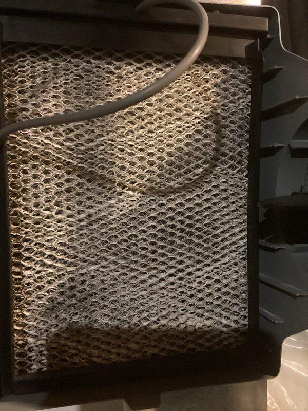 Performed scheduled MVP Heating maintenance service on a Carrier furnace system. Conducted thorough inspection of all components, including PVC ventilation/drainage assembly and control systems. Filter was examined showing normal wear pattern with some dust accumulation; cleaned or replaced as needed to ensure optimal system performance.