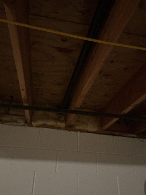 Cleared kitchen sink clog and repaired non-functioning garbage disposal. Diagnosed and replaced damaged toilet tank seal that was causing leakage upon flushing. Inspected basement area to verify no additional water damage to ceiling joists or structural elements.