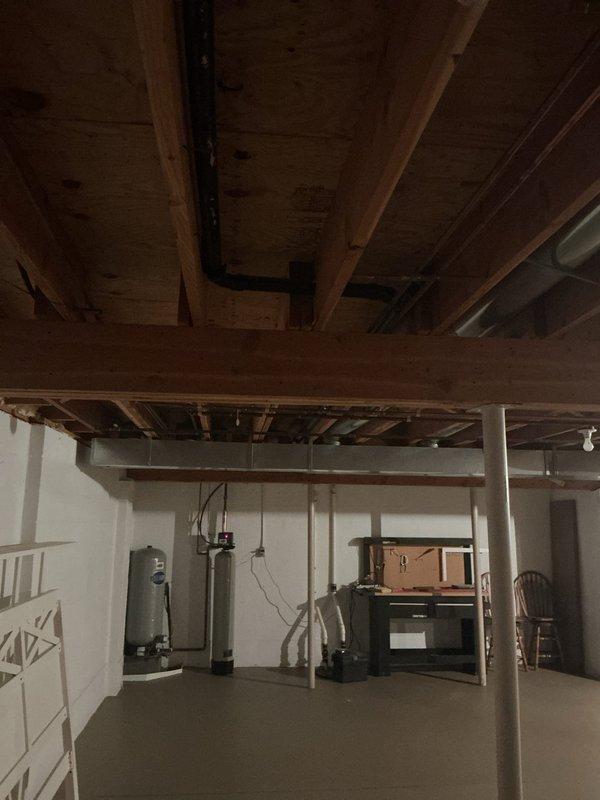 Cleared kitchen sink clog and repaired non-functioning garbage disposal. Diagnosed and replaced damaged toilet tank seal that was causing leakage upon flushing. Inspected basement area to verify no additional water damage to ceiling joists or structural elements.