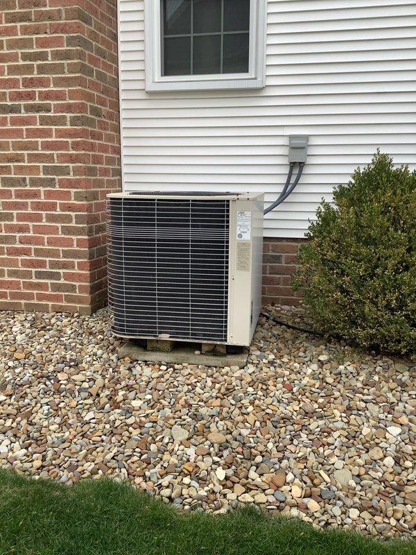 Performed annual preventative maintenance tune-up on a Lennox C28-51GEN heat pump system. Inspected refrigerant lines, connections, and verified system pressure remained within manufacturer specifications (maximum 450 PSI). Unit is properly installed on stone bed with adequate clearance for airflow, with electrical connections and refrigerant lines in good condition.