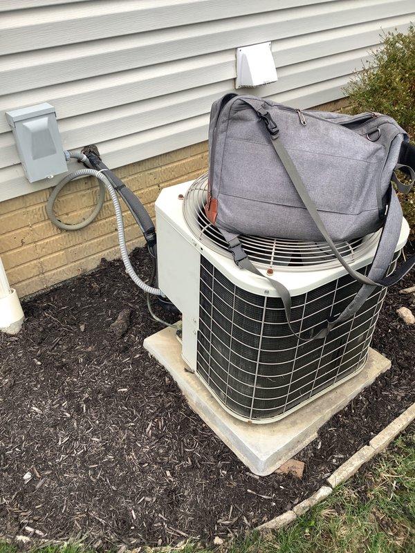 Completed BOGO promotion estimate for furnace and AC replacement. Inspected existing Lennox HVAC system including indoor furnace with PVC ventilation and outdoor condenser unit positioned on concrete pad with appropriate electrical connections. Documented current installation configuration for proper replacement planning.