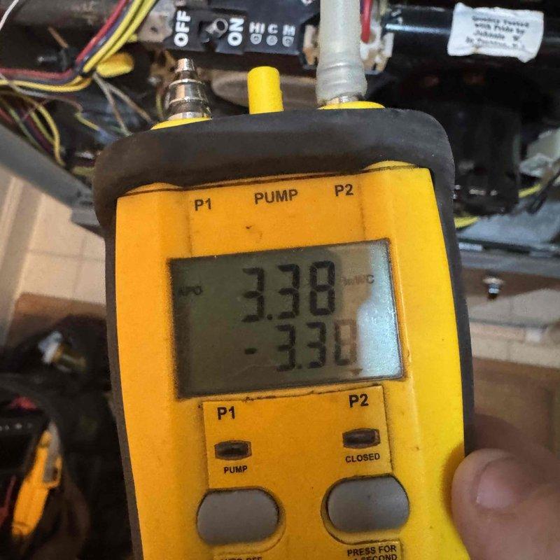 Diagnosed 19-year-old gas furnace producing humming noise as reported by customer. Used digital manometer to verify gas pressure readings (3.38/-3.30) and inspected control board wiring connections. Identified and resolved electrical issue causing the humming sound, restoring proper furnace operation.