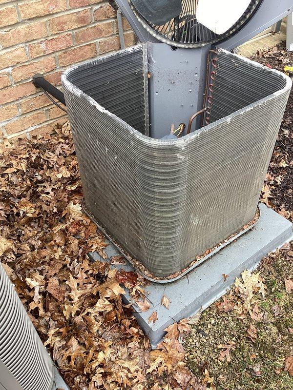 Performed scheduled maintenance on two heat pump systems, finding both outdoor condensing units with significant dirt accumulation on coils and cabinets. Removed access panels, thoroughly cleaned condenser coils to remove debris buildup and mineral deposits, cleared fallen leaves from around units, and inspected electrical connections and fan assemblies for proper operation to restore optimal heating efficiency.