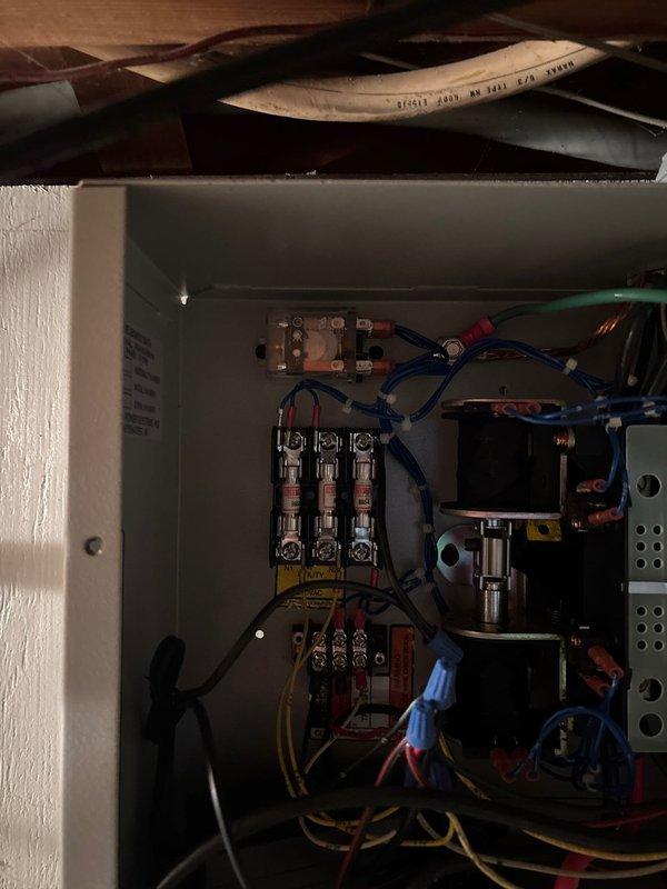 Diagnosed 17-year-old Generac generator that was starting but failing to supply power to the residence. Inspection of electrical panels revealed issues with the transfer switch connections and deteriorated wiring insulation in the control box. Repaired faulty connections and replaced damaged wiring to restore proper functionality.