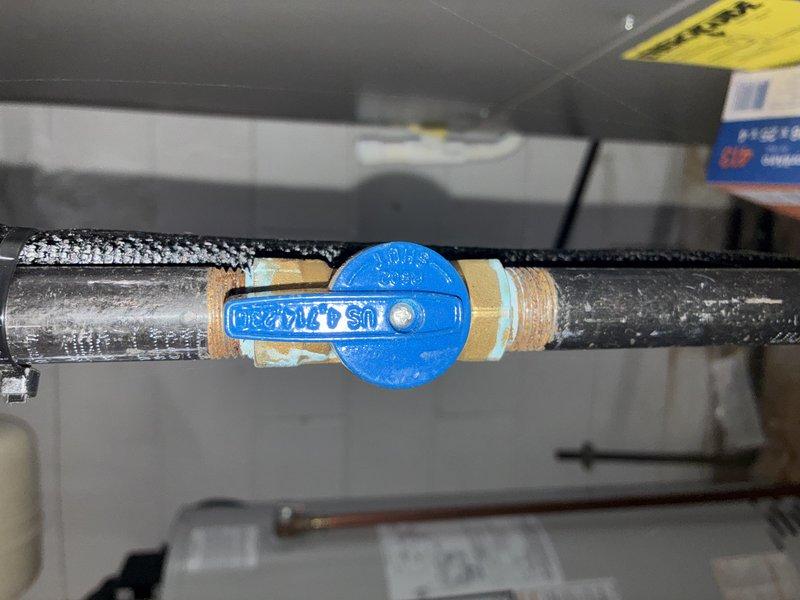 Performed scheduled cooling maintenance service after 1pm as requested. Replaced dirty pleated air filter with significant particulate accumulation that was affecting system efficiency. Inspected water shutoff valve and associated plumbing connections, noting proper installation of threaded fittings with appropriate sealing material.