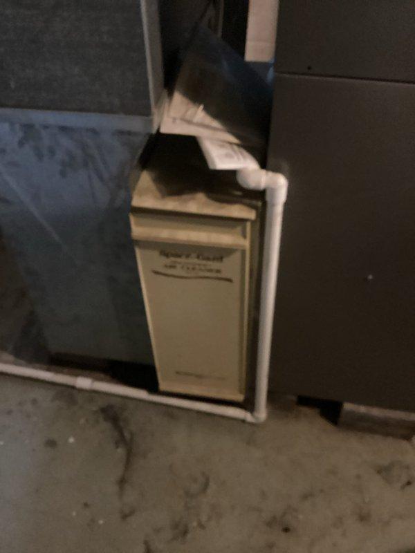 Performed routine maintenance on a Lennox cooling system as part of recurring MVP Cooling service. Inspected the furnace/air handler unit and associated components in the utility area. Documented system condition with photos for service records.