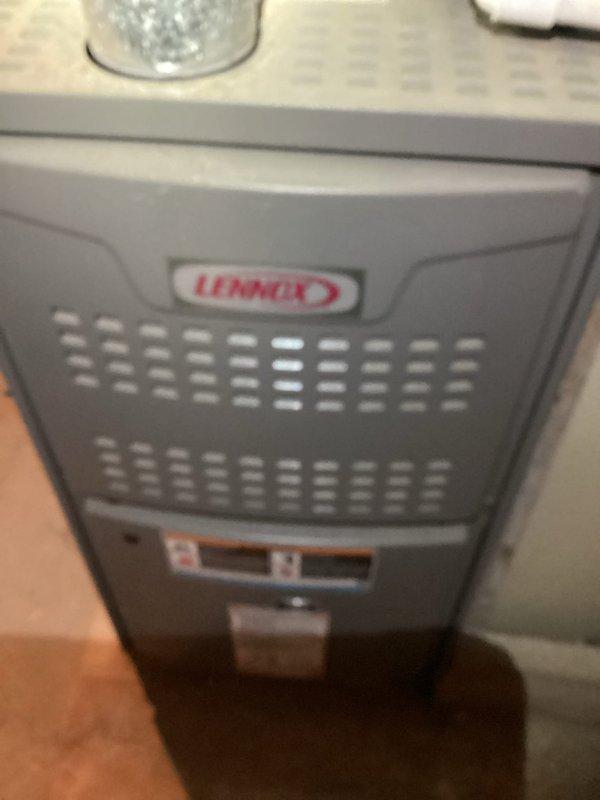 Performed routine maintenance on a Lennox cooling system as part of recurring MVP Cooling service. Inspected the furnace/air handler unit and associated components in the utility area. Documented system condition with photos for service records.