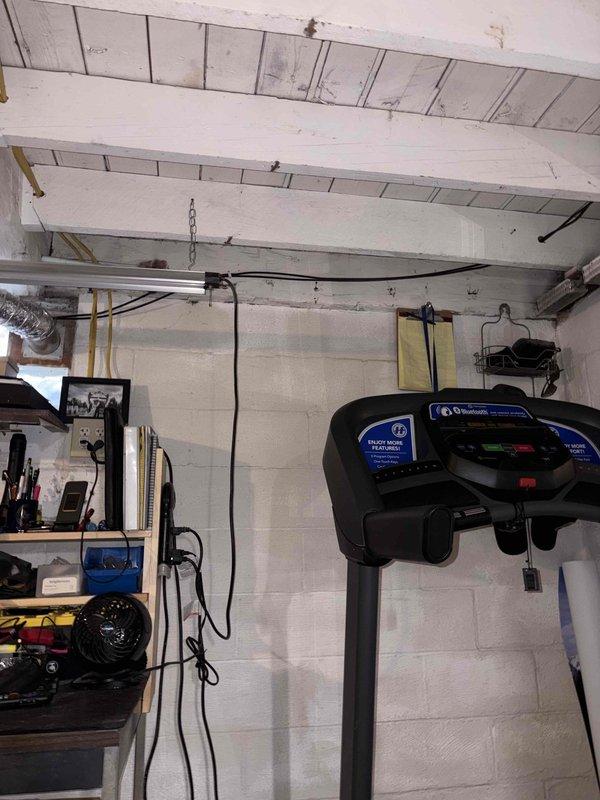 Completed residential generator installation assessment for a 1910-era property. Documented potential installation locations in basement utility area, noting service conductor exit point and proposed dual panel locations. Site evaluation included examination of existing electrical infrastructure to accommodate Generac generator system.