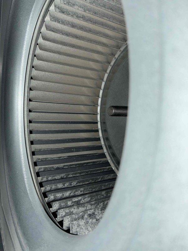 Performed routine maintenance on 5-year-old furnace, including inspection and cleaning of blower wheel which showed significant dust accumulation on lower section. Used hex key tool to make necessary adjustments to system components, restoring optimal airflow and efficiency.
