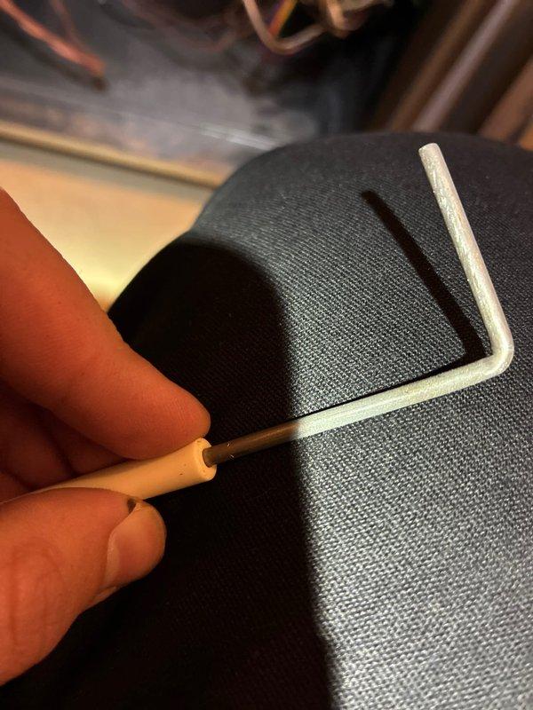 Performed routine maintenance on 5-year-old furnace, including inspection and cleaning of blower wheel which showed significant dust accumulation on lower section. Used hex key tool to make necessary adjustments to system components, restoring optimal airflow and efficiency.