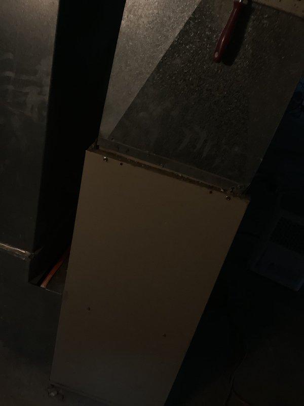 Provided comprehensive HVAC system replacement estimate for 20-year-old furnace and air conditioning unit. Customer expressed interest in promotional offer for air conditioning replacement. Documented existing equipment configuration including furnace installation in basement mechanical room and ductwork system, photographed current system components and layout for proposal specifications.