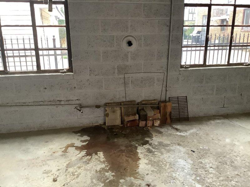 # Radiator Removal and Gas Line Disconnection

Successfully completed the removal and disposal of an old self-sufficient radiator system from an interior utility space. The project required a two-person crew to safely disconnect the gas supply line, remove the existing shut-off valve, and properly cap the tee connection to ensure a secure seal. The radiator unit was carefully extracted from the space and hauled away using specialized equipment with a lift gate due to the unit's substantial weight and size. All necessary parts were procured and the gas line was properly terminated according to code requirements, leaving the space ready for future use or alternative heating installation.