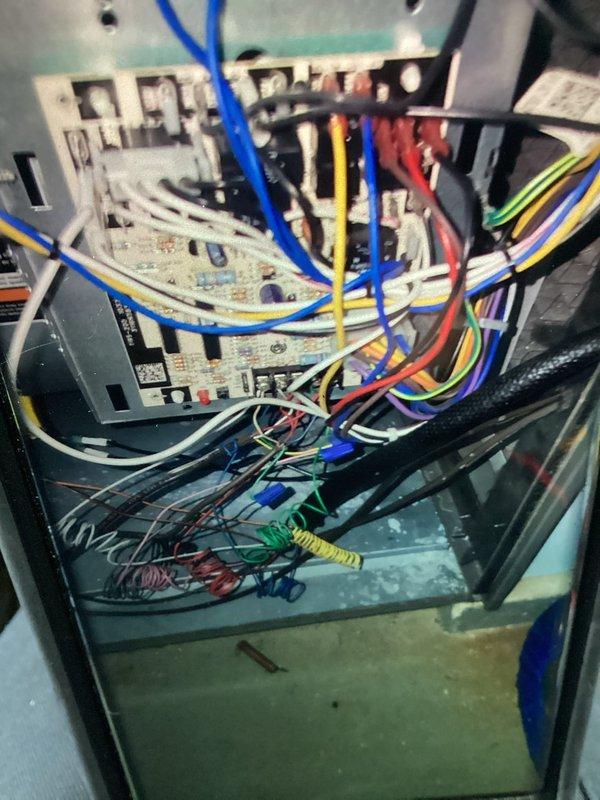 Completed Early Bird air conditioning tune-up service on residential HVAC system. Performed comprehensive inspection of air handler unit, noting significant dust and debris accumulation on interior metallic surfaces and components requiring attention during maintenance. Inspected electrical control panel, verified all wire connections and terminals on control board, and confirmed proper operation of electronic control module and associated wiring harnesses.