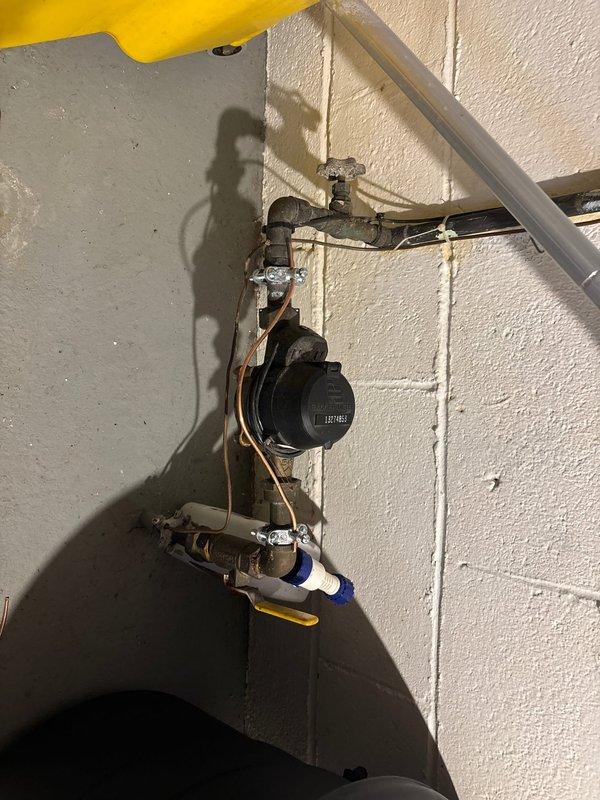 # Electrical Service Panel Upgrade and Grounding System Installation

Completed comprehensive electrical service upgrade including installation of new exterior electrical panel with integrated exterior disconnect switch. Replaced outdated service equipment to meet current electrical code requirements and improve system safety and reliability.

Updated entire grounding system throughout the residence to ensure proper electrical safety. Installed new ground rod electrodes and established proper grounding electrode system connections. Connected bonding wire to water service line entry point to maintain electrical continuity and safety per NEC standards. Installed bonding jumper to water heater to ensure proper equipment grounding and prevent potential shock hazards.

All grounding conductors were properly sized and terminated using approved methods. Verified continuity of grounding system and tested resistance to ensure compliance with code requirements. Service upgrade provides enhanced 