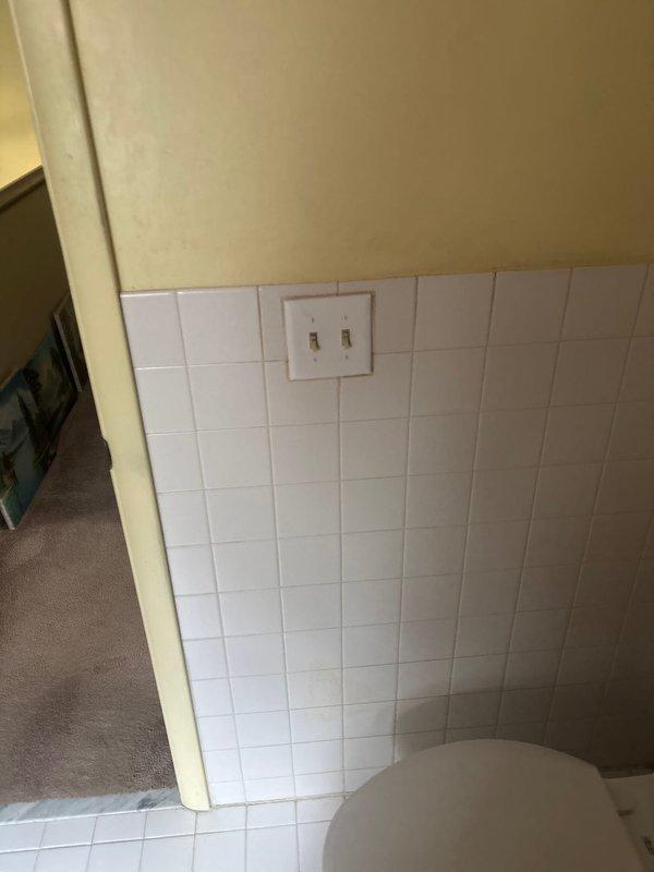 # Electrical Service Report

Responded to service call for multiple non-functioning outlets, light switches, and lighting fixtures throughout the residence. Performed comprehensive electrical troubleshooting to identify circuit issues affecting kitchen and hallway areas. Inspected and tested electrical outlets and switch assemblies, including dual-switch configuration in tiled hallway area and kitchen switch near cooking appliances. Verified proper circuit functionality, identified faulty connections, and restored power to all affected fixtures and receptacles. All switches and outlets tested operational upon completion of repairs.