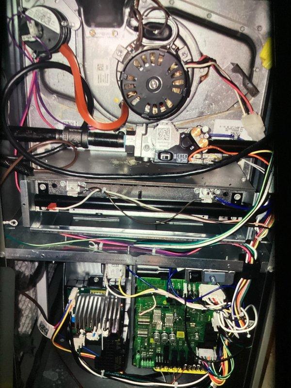 # HVAC Maintenance - Heating Service Report

Completed scheduled MVP heating maintenance visit on residential furnace system. Performed comprehensive inspection of internal components including blower motor assembly, gas valve, and primary control board. Removed access panels to examine motor connections, wire harnesses, and circuit board for signs of wear, loose connections, or component degradation.

Inspected blower motor terminals and verified all wire connections were secure with no signs of overheating or corrosion. Examined gas valve assembly for proper operation and confirmed all fittings and connections were intact. Conducted detailed assessment of main control board, including integrated circuits, capacitors, and heat sink assembly to ensure proper functioning of system controls. All wire harnesses, including low-voltage control wires and power connections, were inspected and found to be properly routed with adequate cable management.

System components showed normal operatio