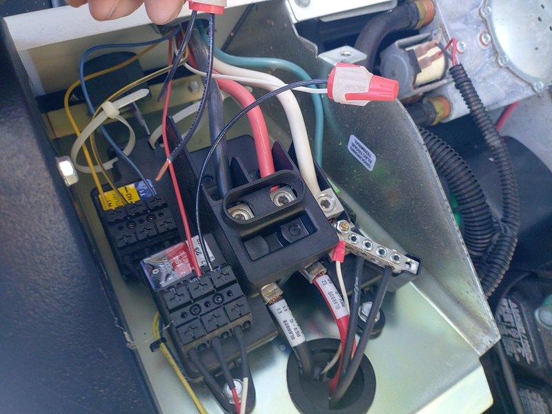 # Generator Service Call - No Start During Outage

Responded to service call for 4-year-old Generac 20/18kW standby generator that failed to start during recent power outage. Performed diagnostic testing of transfer switch and generator control panel. Inspected main electrical connections, circuit breakers, and control wiring within transfer switch enclosure. Verified proper voltage at transfer switch terminals and tested relay contacts and control circuits. Examined generator control board connections, capacitor condition, and associated wiring harness for signs of failure or loose connections. Identified failed component preventing automatic transfer sequence initiation. Completed voltage and continuity testing across multiple circuits to isolate fault. Unit restored to proper operation and tested through simulated power outage cycle to confirm automatic start and transfer functionality.
