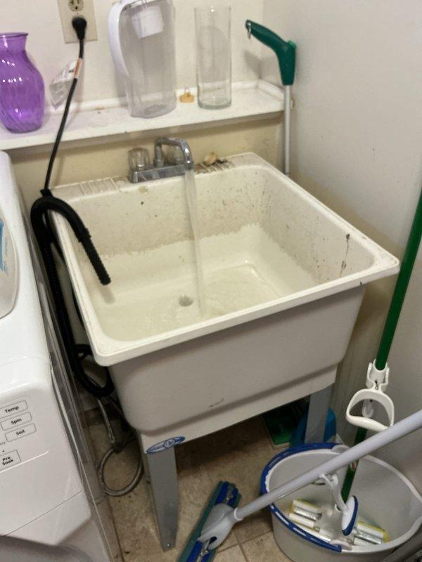 # Plumbing Service Completed

Responded to service call for multiple plumbing issues including intermittent upstairs shower drain clogging, inadequate hot water supply during showers, and cold water problems in the basement utility area. Upon inspection, assessed water heater condition and functionality in basement mechanical room, examining copper supply lines, pressure relief valve, and thermostat controls. Evaluated utility sink drainage system and inspected plumbing fixtures throughout the property to identify root causes of reported issues and determine appropriate corrective measures.