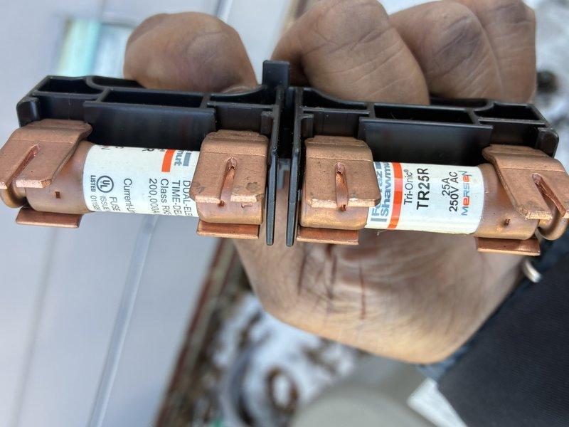 Completed comprehensive cooling system tune-up and inspection of air conditioning unit. Performed visual examination of electrical disconnect box and fuse assembly, documenting component condition with photographs. Advised customer that furnace maintenance is not required at this time as it was recently serviced in September.