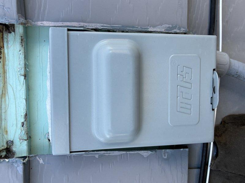 Completed comprehensive cooling system tune-up and inspection of air conditioning unit. Performed visual examination of electrical disconnect box and fuse assembly, documenting component condition with photographs. Advised customer that furnace maintenance is not required at this time as it was recently serviced in September.